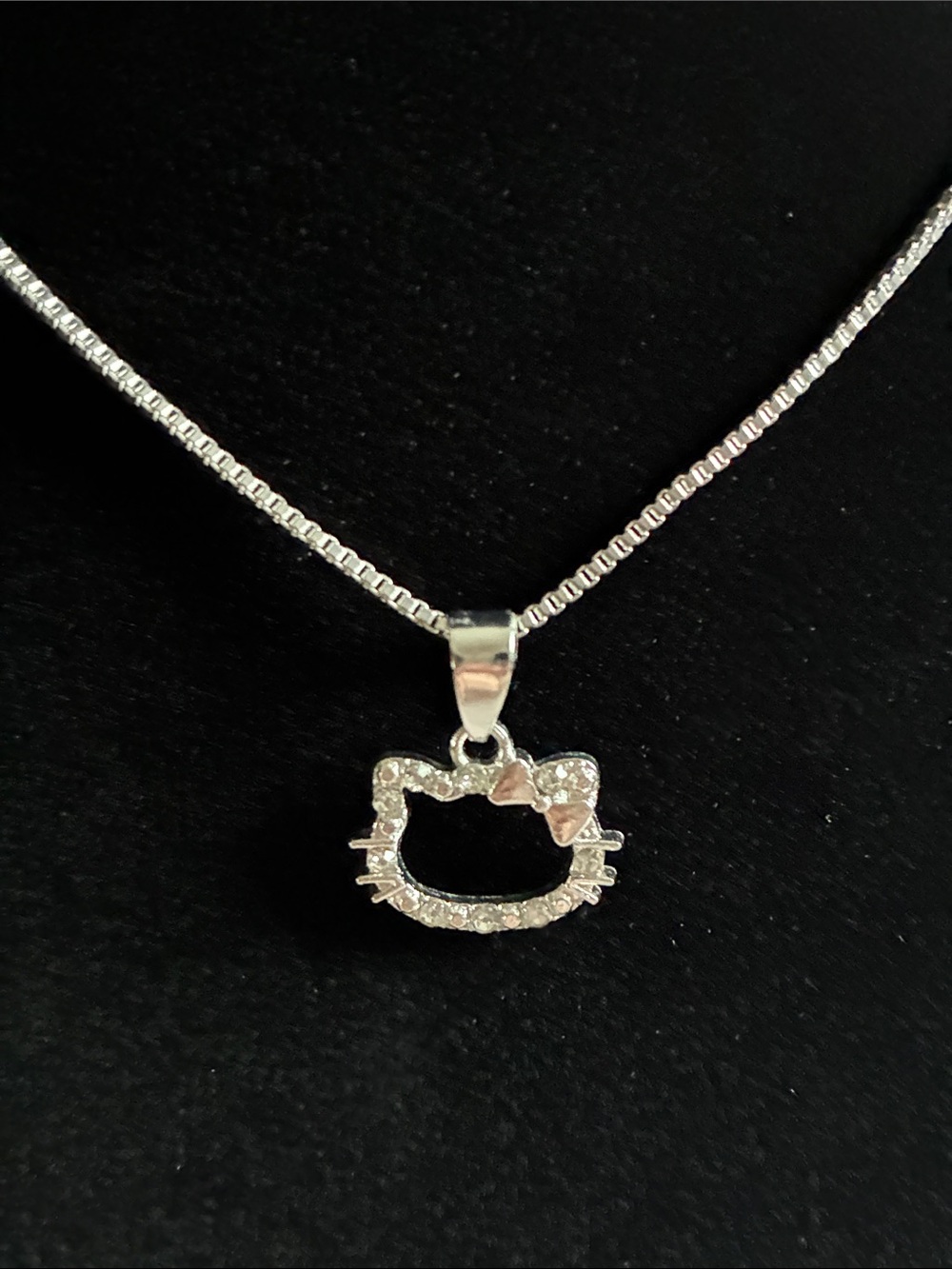 Hello Kitty Silver-tone Crystal Outline Necklace with Pink Bow Accent